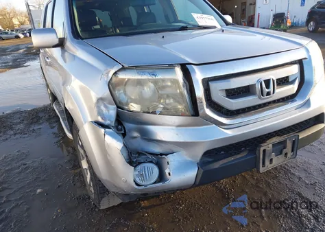 2011 Honda Pilot Touring z USA, uszkodzony, nr VIN 5FNYF4H9XBB056690